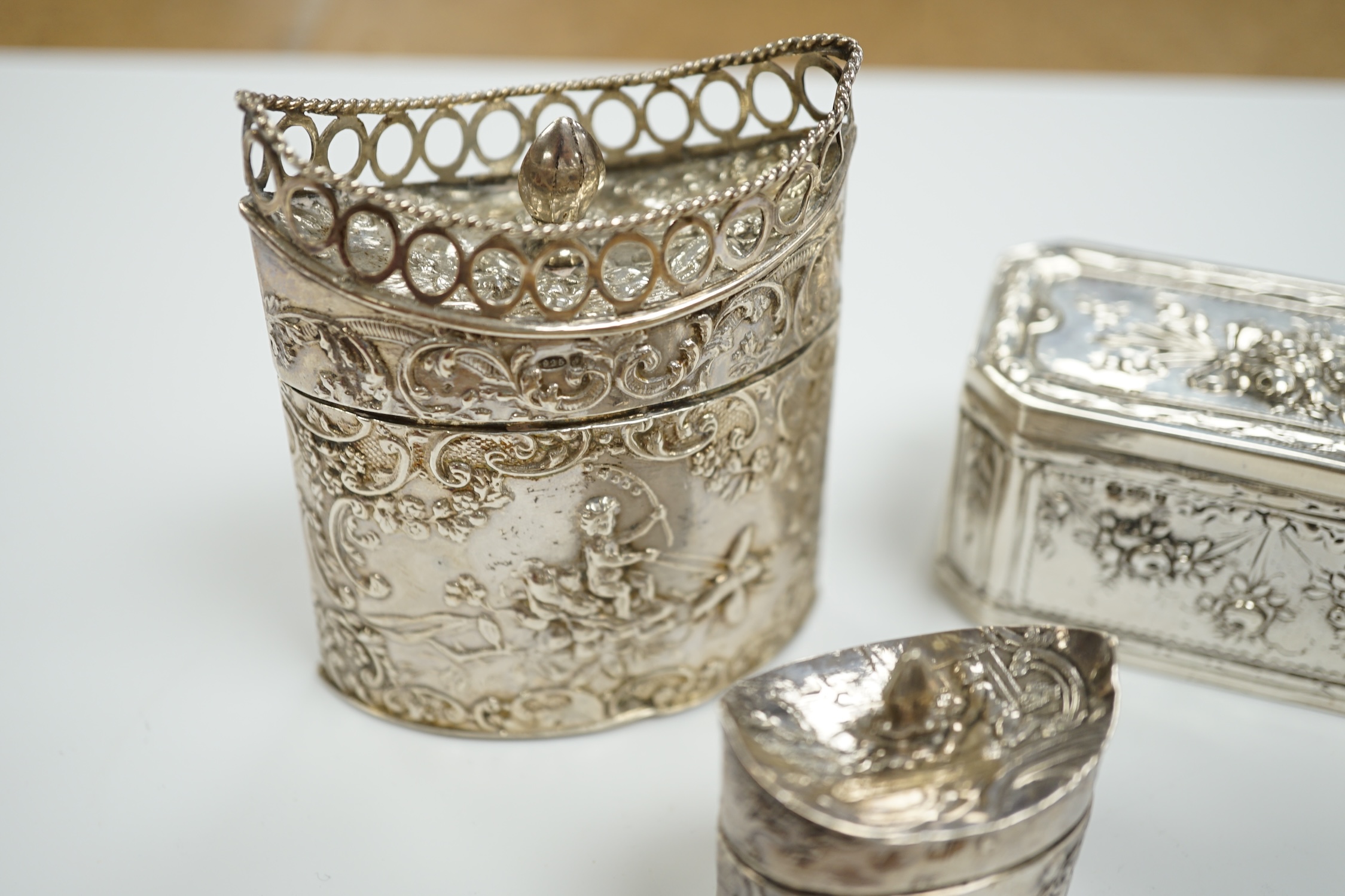 Three assorted late 19th century Dutch white metal boxes, largest 80mm.